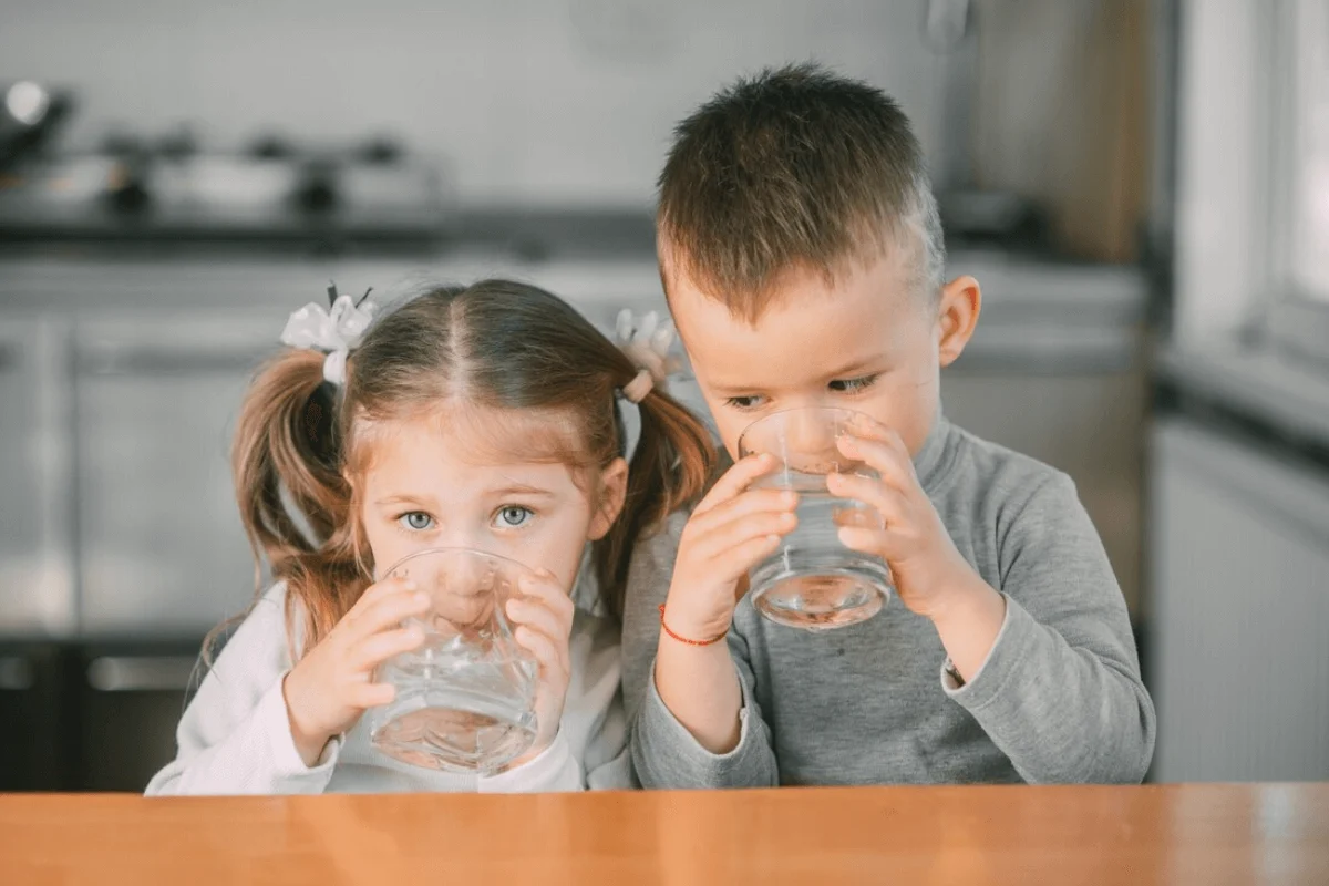 Child drinking pure filtered water